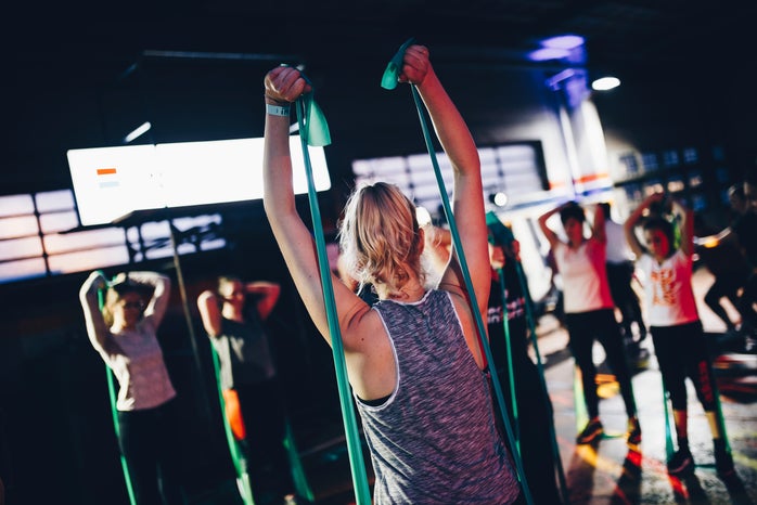 group of people in gym exercising