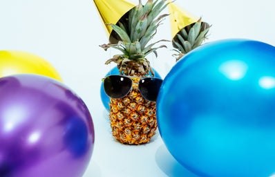 photo of pineapple fruit with sunglasses