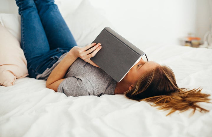 Woman reading a book in bed by Daria Shevtsova?width=719&height=464&fit=crop&auto=webp
