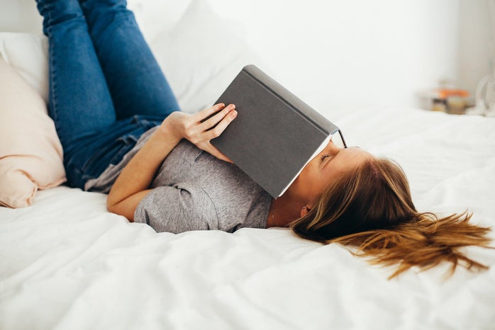 Woman reading a book in bed by Daria Shevtsova?width=698&height=466&fit=crop&auto=webp