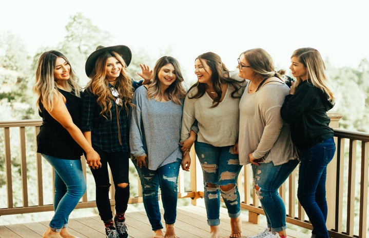 group of women taking a photo