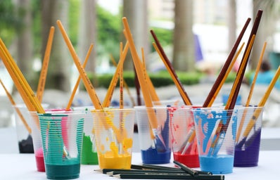 Paint Brushes Inside Clear Plastic Cups