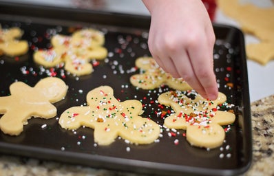 Person Baking Cookies on Tray