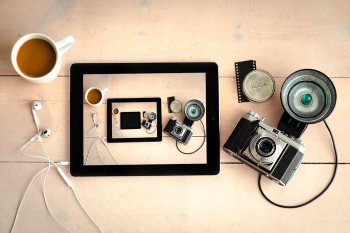 Gray SLR Camera and Black Tablet Computer