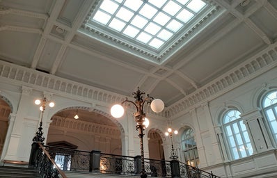 The Lobby in the Finnish National Gallery Ateneum. Staircase, lamps and skylight.