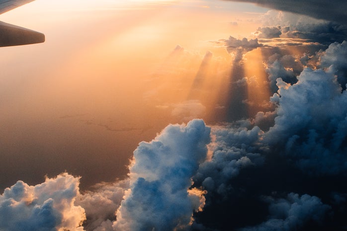 airplane on sky during golden hour