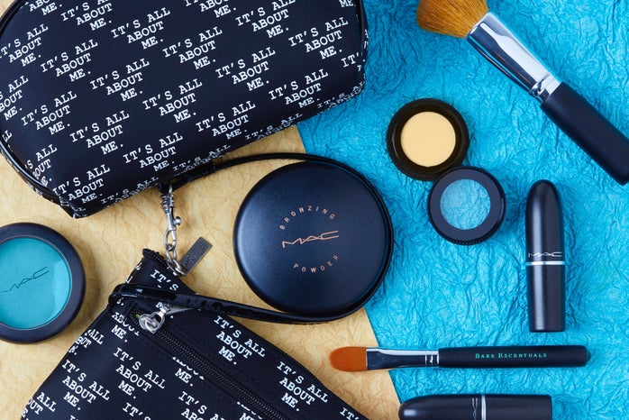 assorted make-up products against a yellow and blue background