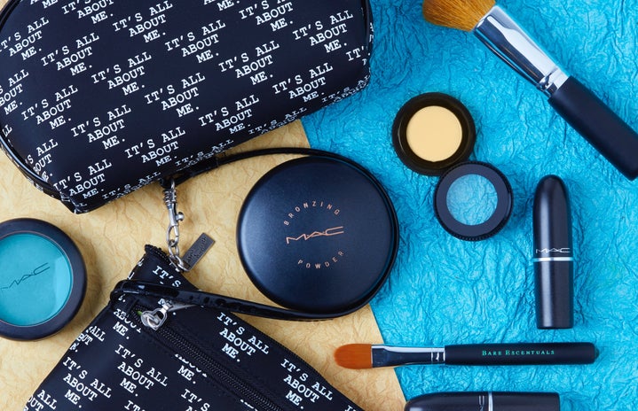 assorted make-up products against a yellow and blue background