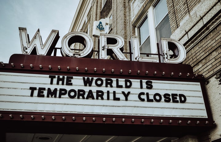"THE WORLD IS TEMPORARILY CLOSED" movie sign