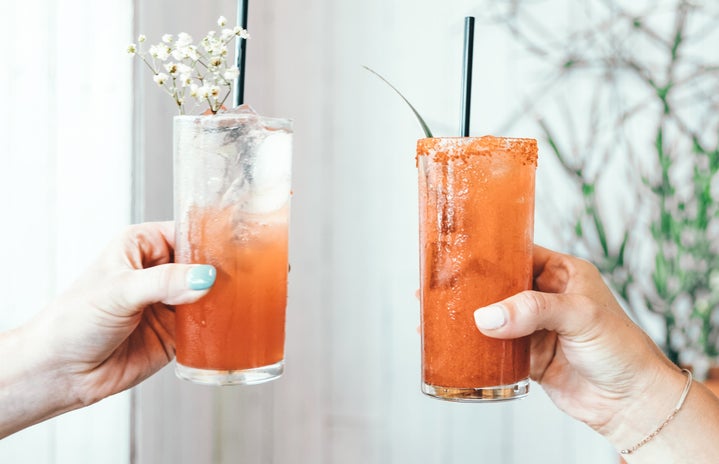 hands holding two drinks by Spencer Davis for Unsplash?width=719&height=464&fit=crop&auto=webp