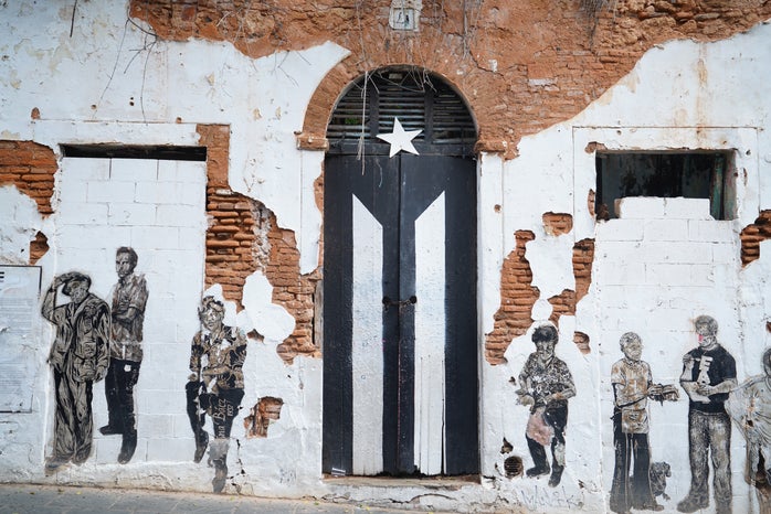 door with painted flag in San Juan, Puerto Rico