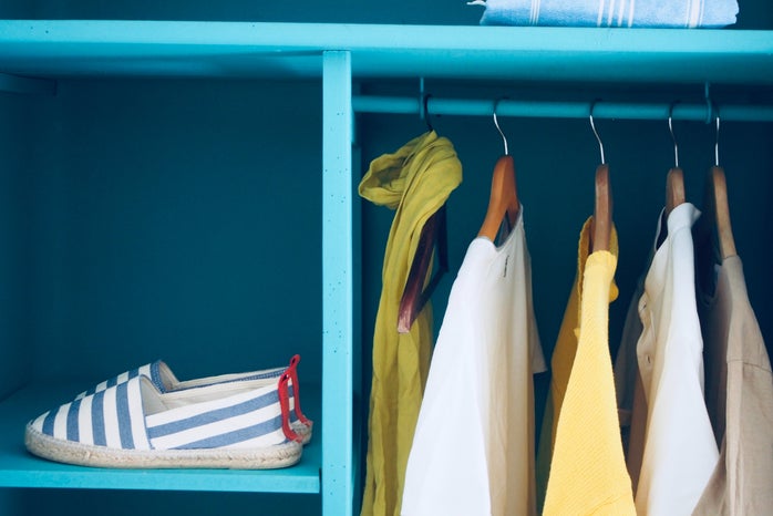 blue shelf with a pair of shoes on it