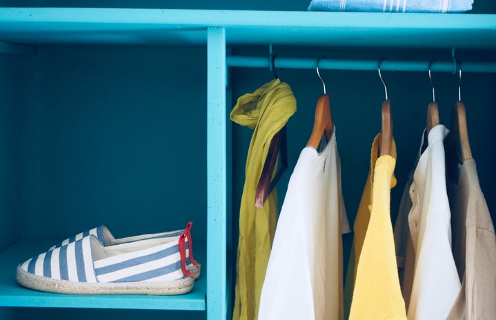 blue shelf with a pair of shoes on it