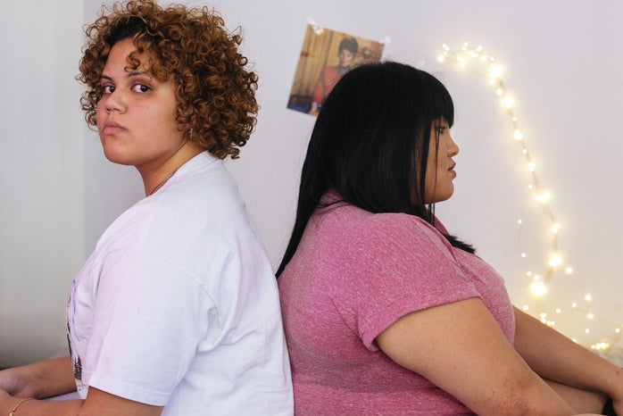 two unhappy multiracial women in room?width=698&height=466&fit=crop&auto=webp
