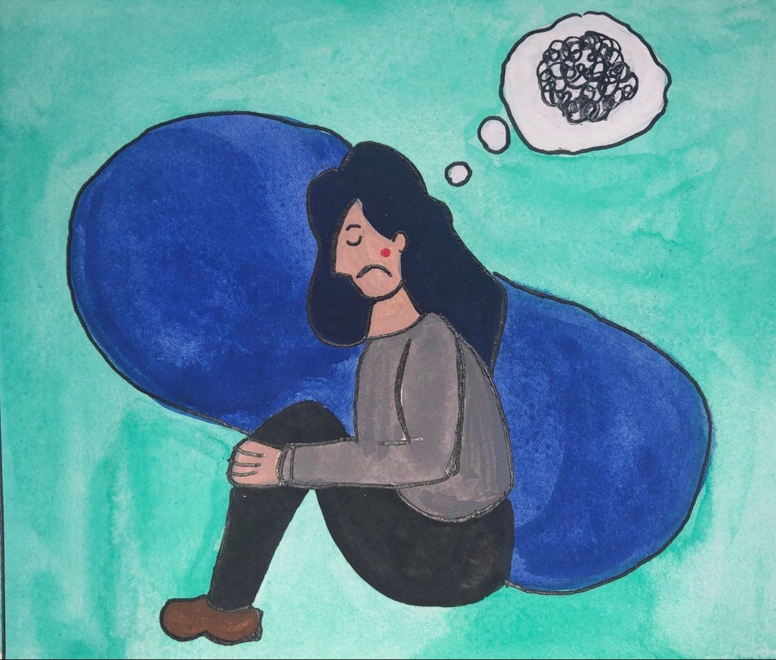 A girl sitting.