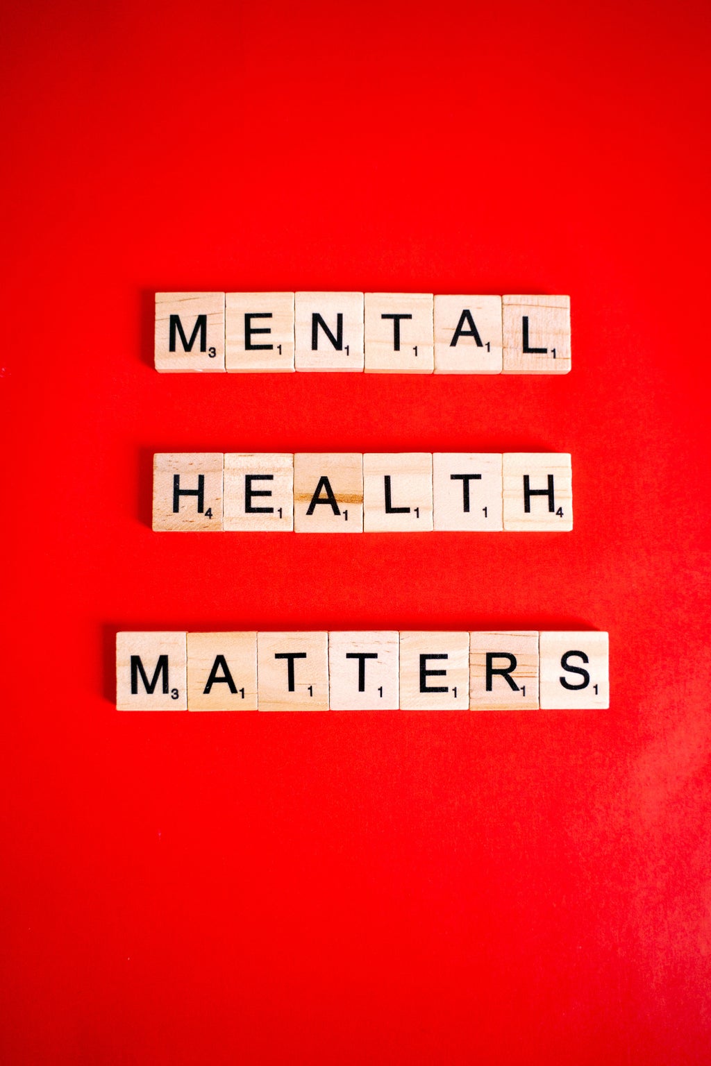 block letters spelling out "mental health matters" on a red background