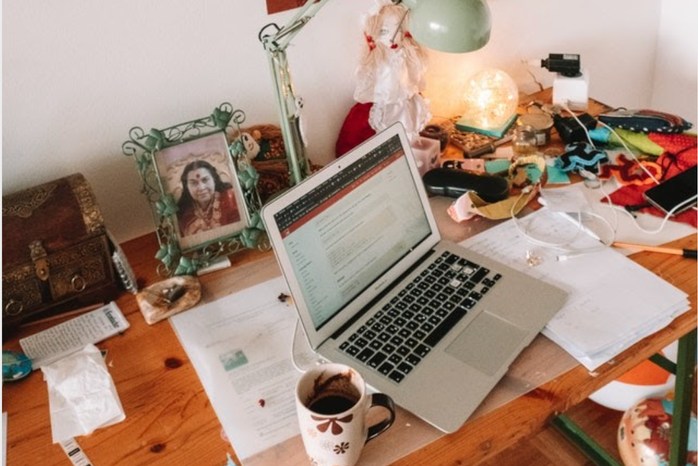 work space with computer and coffee mug