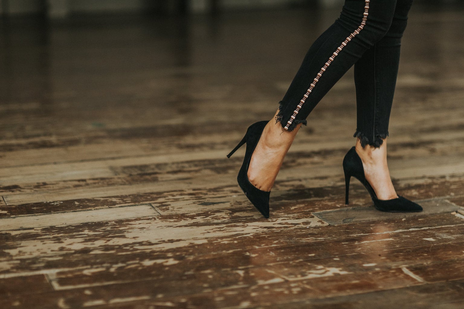 Black Heels on wood floor