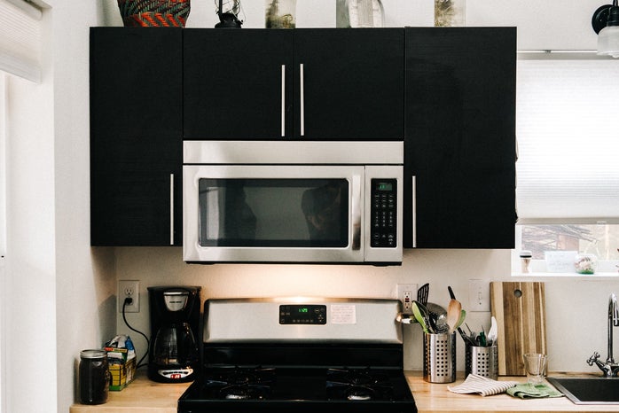 Kitchen with microwave and stove