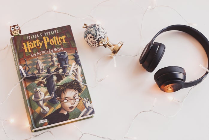 Harry Potter Book and Black Headphones With Trinket