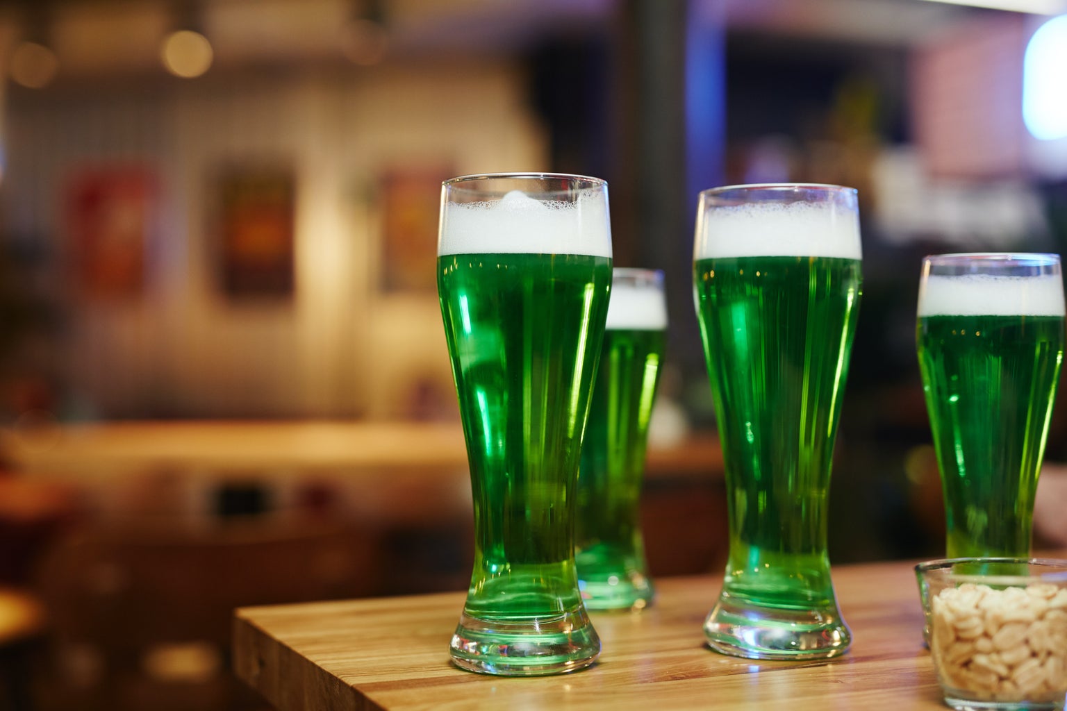 Green pints at a pub
