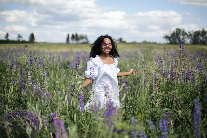 woman in field full of lavender