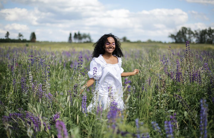 woman in field full of lavender