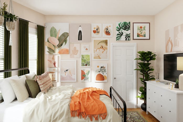 white bedroom with art prints