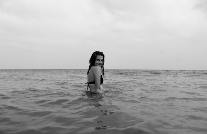black and white girl in water by Lauren Hammett?width=719&height=464&fit=crop&auto=webp