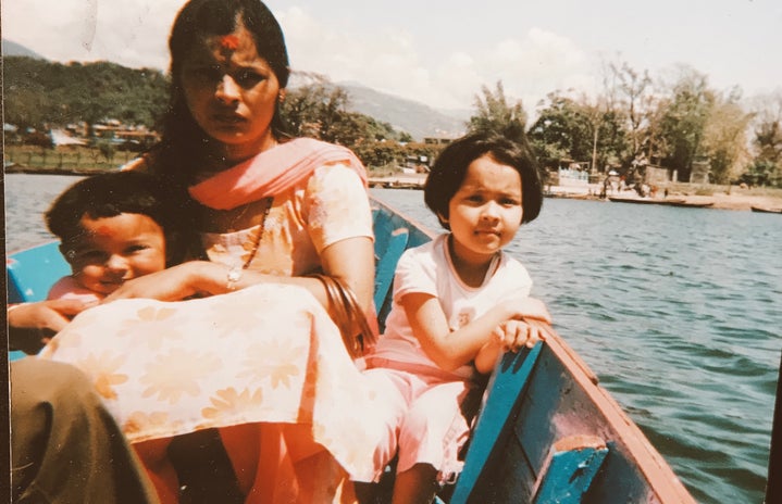 A picture of my mother, my sister, and me during a family vacation. Location: Pokhara, Nepal
