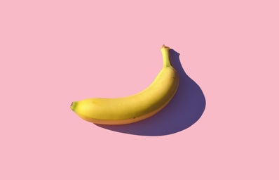 yellow banana on a pink background
