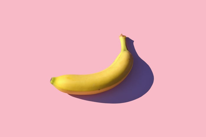 yellow banana on a pink background