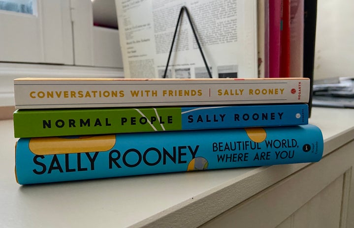 Photo of three books stacked