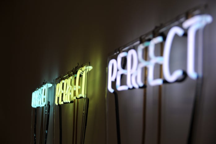 three neon signs that say \"perfect\"