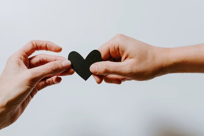 holding heartpng by Unsplash?width=698&height=466&fit=crop&auto=webp