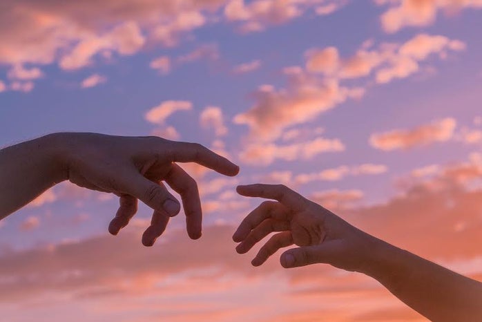 Hands in the sunset