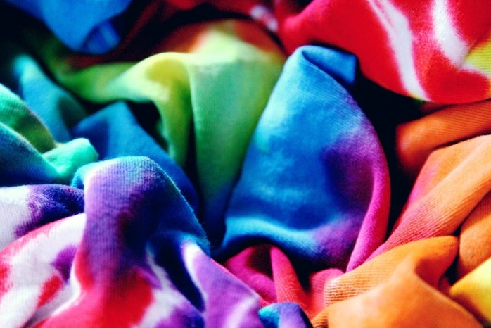 closeup of scrunched tie dye shirts in rainbow colors