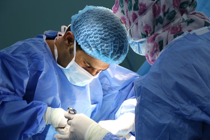 two surgeons performing an operation