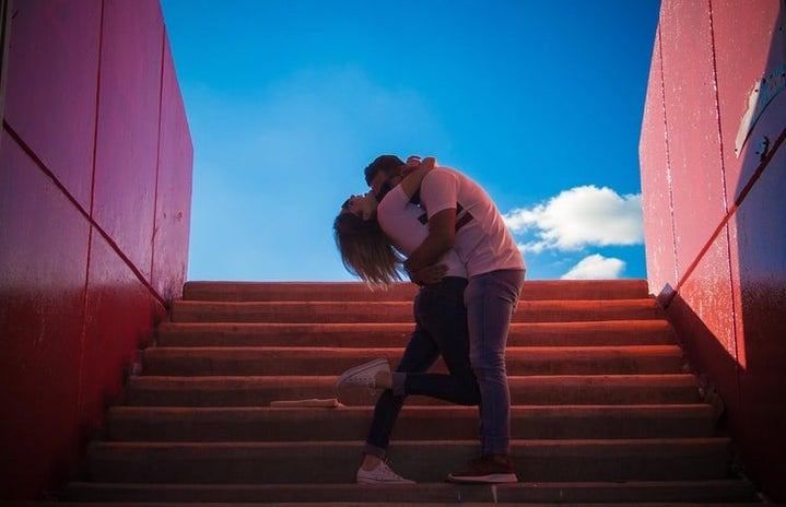 man and woman kissing on stairsjpg by Unsplash?width=719&height=464&fit=crop&auto=webp