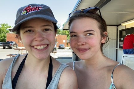 two sisters taking a selfie