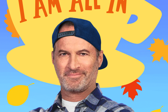 Blue, yellow and orange podcast logo featuring Scott Patterson in a blue cap and flannel shirt with the words \"I Am All In\" written on a yellow coffee mug with leaves falling in the back