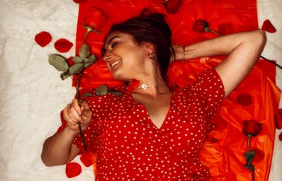 woman in red with roses