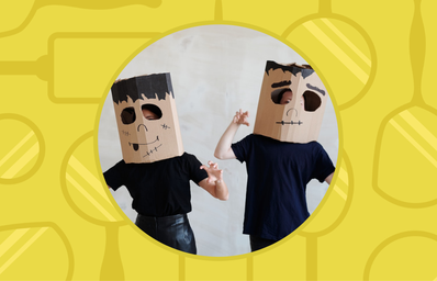 people waring cardboard masks