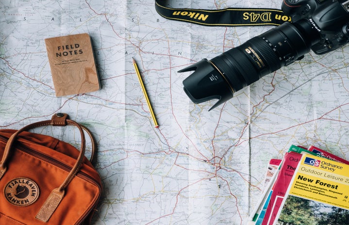 camera maps and bags on map by Unsplash?width=719&height=464&fit=crop&auto=webp