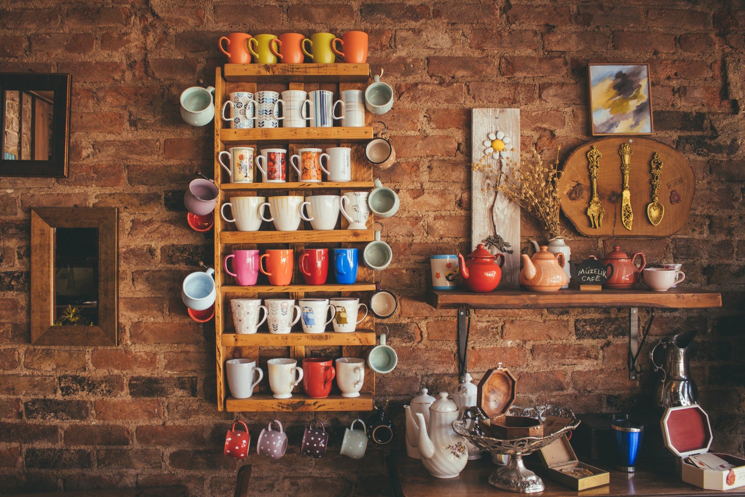 assorted mugs on wall zodiac decor
