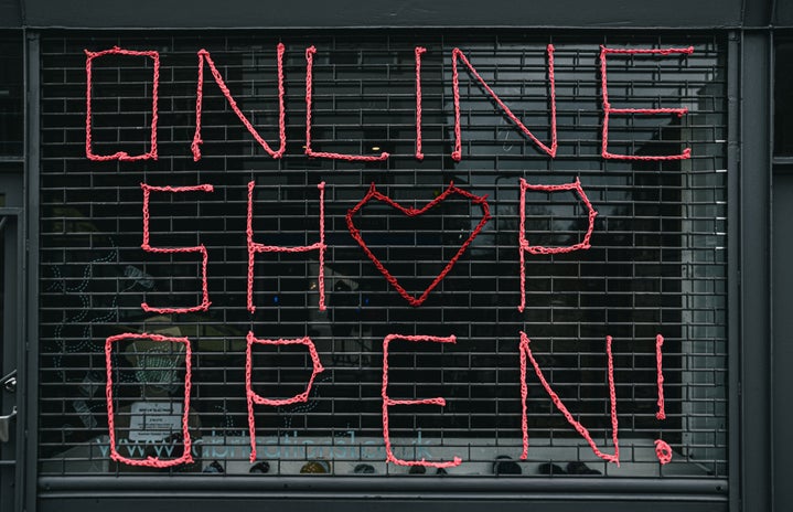 Red Font \"Online Shop Open\" on door