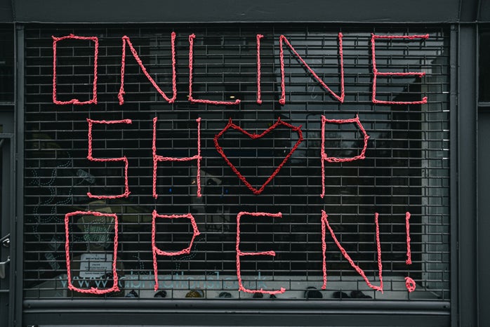 Red Font \"Online Shop Open\" on door