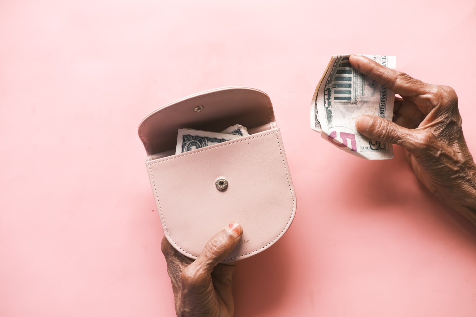 Money in pink purse
