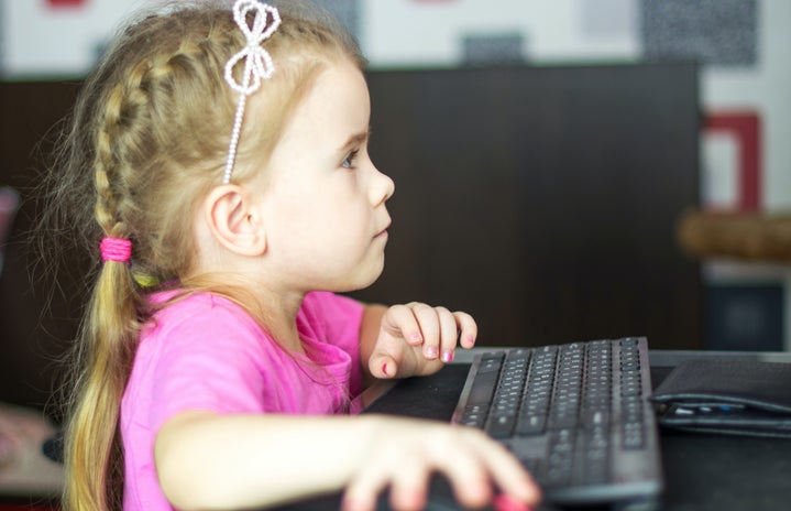 Little girl on computer