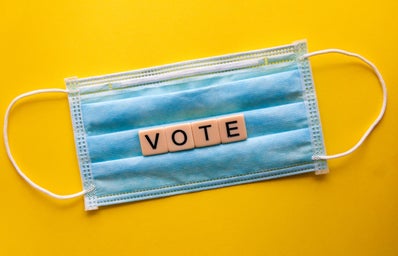 mask with vote in scrabble letters